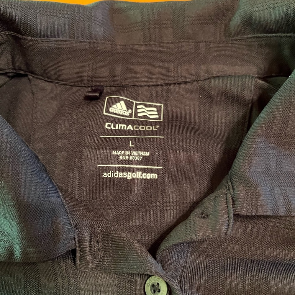 Wmns Adidas size large golf shirt